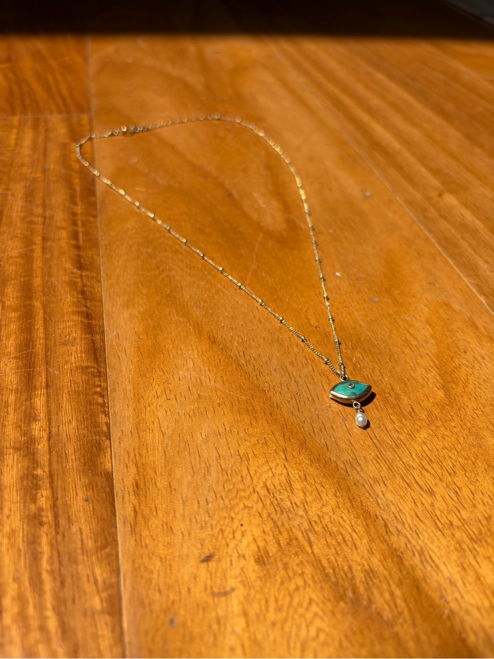 Chan Luu Gold Necklace with Turquoise Evil Eye Pendant and Pearl Accent